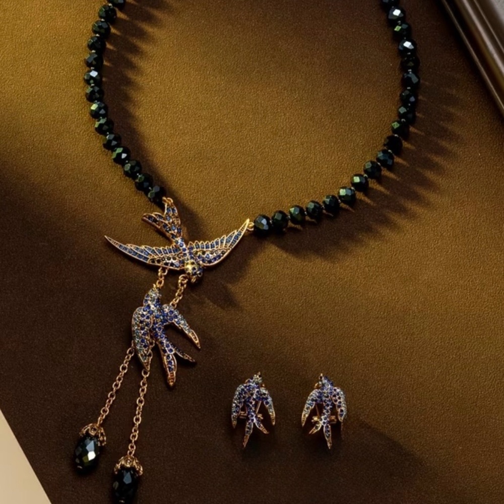 Elegant Blue and Gold Bird Necklace earrings sold separately